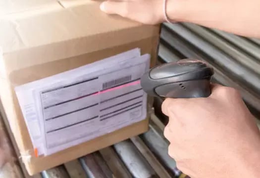 warehouse-worker-are-holding-bar-code-scanner-with-scanning-product_36860-149-e1592216685861